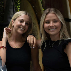 unity studs in silver and gold tone