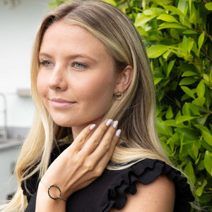 unity studs in silver and gold tone