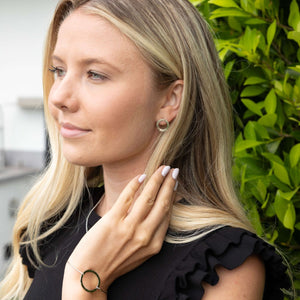 unity studs in silver and gold tone