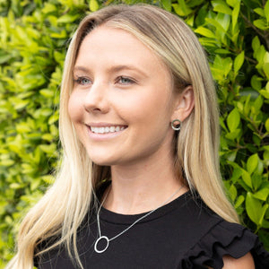 unity studs in silver and gold tone