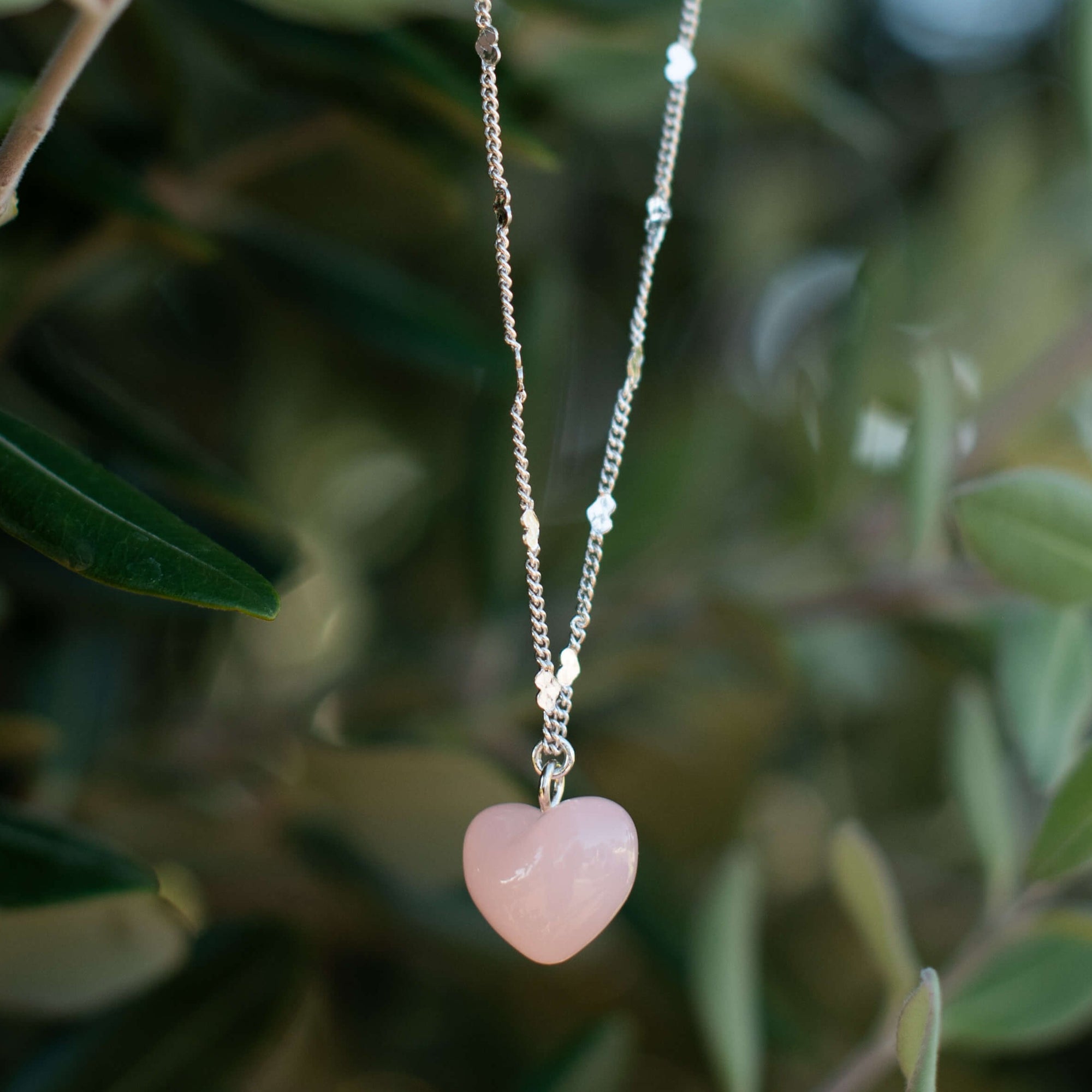 handmade heart chain necklace with pink heart in sterling silver