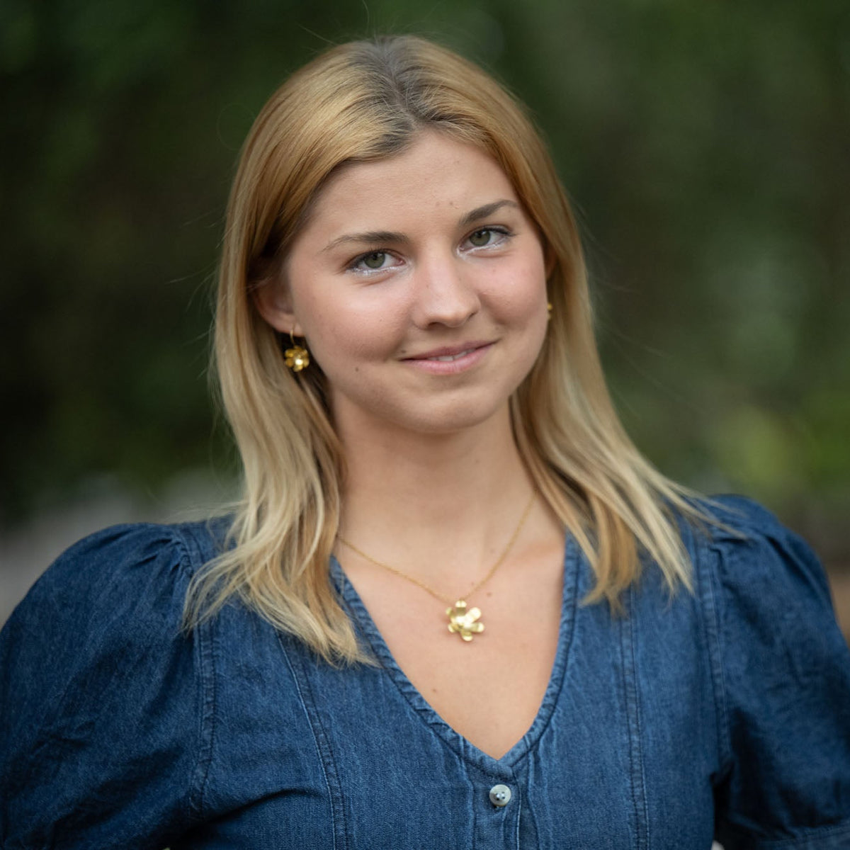 n Victorian floriography, buttercups symbolize childlike joy and innocence. Each buttercup is carefully hand-cut and shaped with love, creating a necklace that adds sophistication to your daytime look and a spark to your evening attire. The design also symbolizes resilience and the ability to flourish even through challenges.

Hand-cut and shaped by a young woman escaping human trafficking in India, your purchase brings hope, dignity, and a brighter future to the artisan 