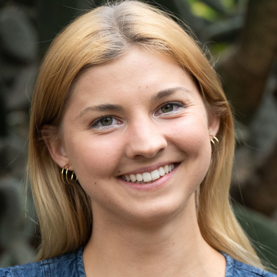 Chloe Huggies earrings, brass and silver, handmade by survivors of trafficking