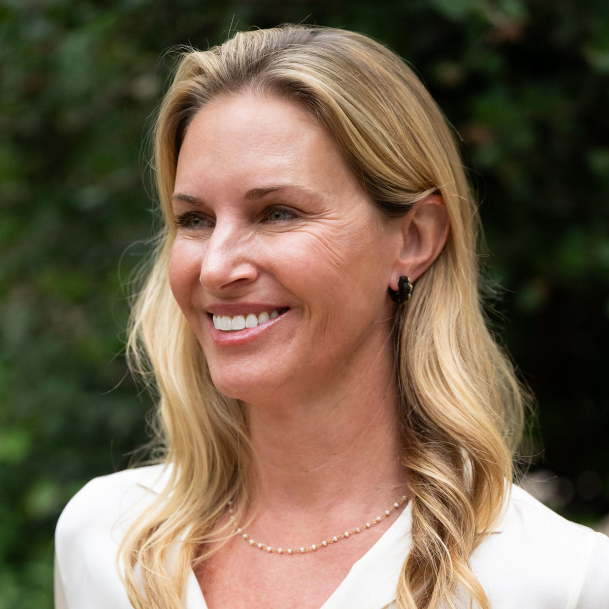 Bring a touch of charm to your style with our Daisy Huggie Ankole Earrings. Designed to gently “hug” your ears, these sweet blooms are handmade in brass with a satin-brushed finish, sterling silver posts, and ankole blooms carefully adhered to the brass.