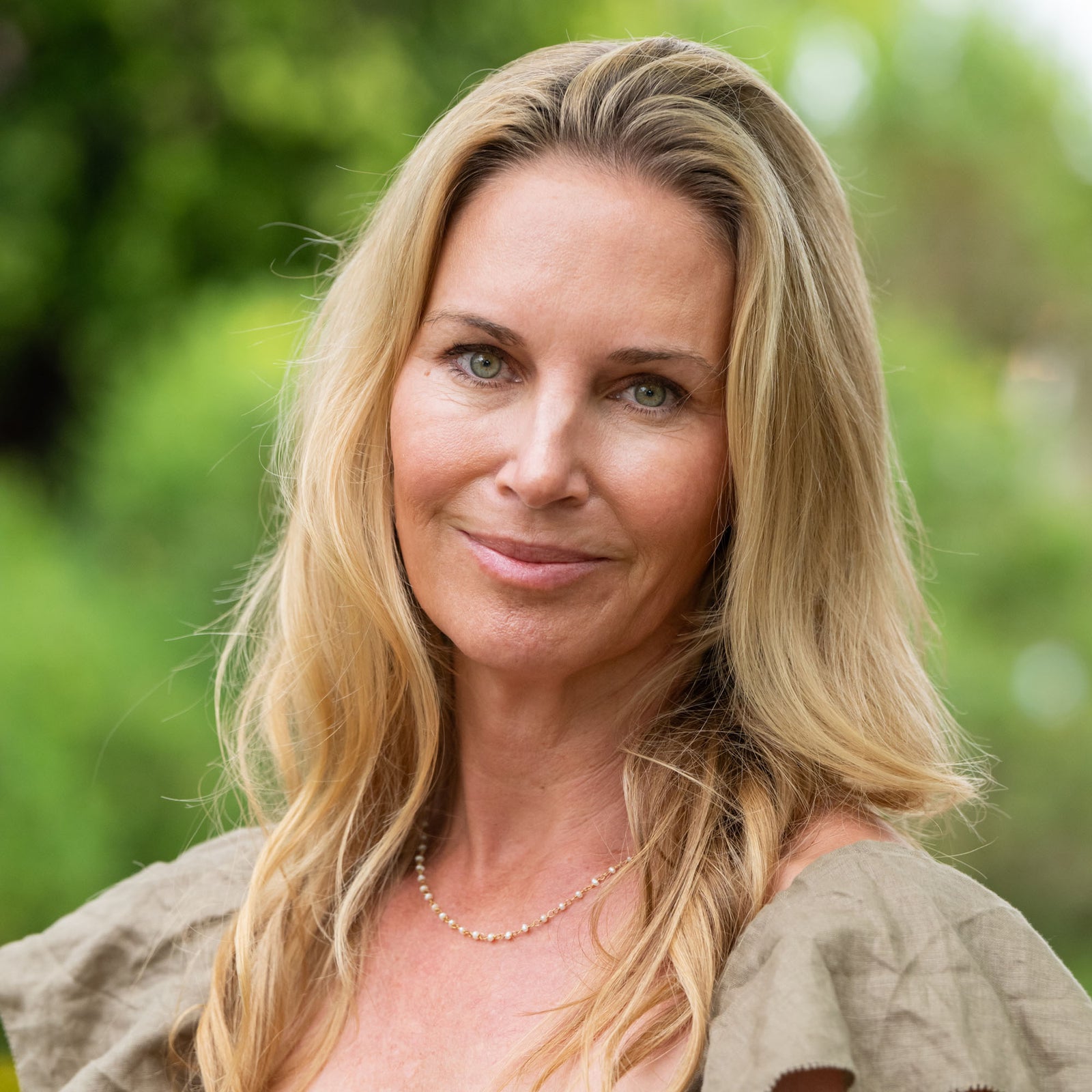 pearl and brass necklace handmade in India handmade by survivors of human trafficking pearl necklace 