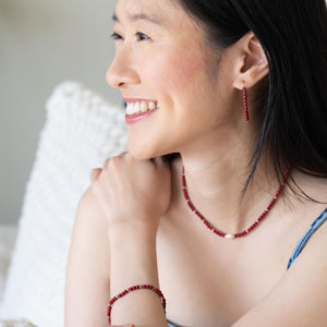 red orange beaded bracelet with pearl - stretchy