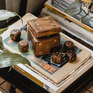 wooden dice box and dice