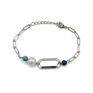 linked pearl bracelet on white